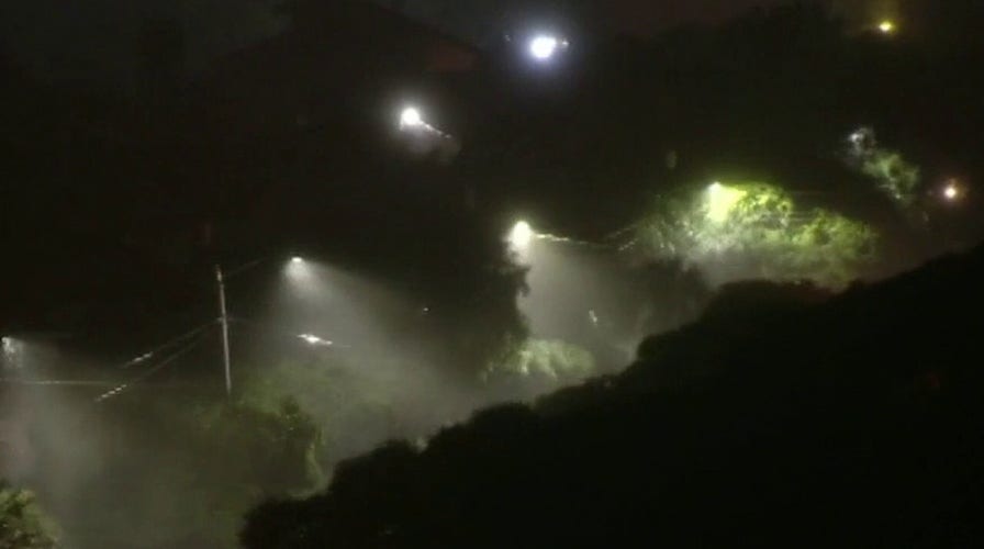 Tropical Storm Isaias barrels up the East Coast, leaving thousands without power