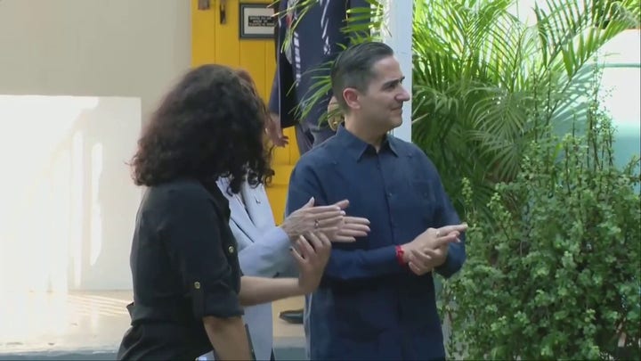Kamala Harris stops clapping during Puerto Rico protest song once aide translates lyrics