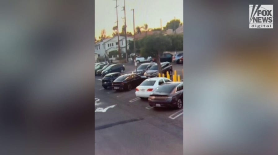 Los Angeles surveillance video shows man dumping large object where headless body found