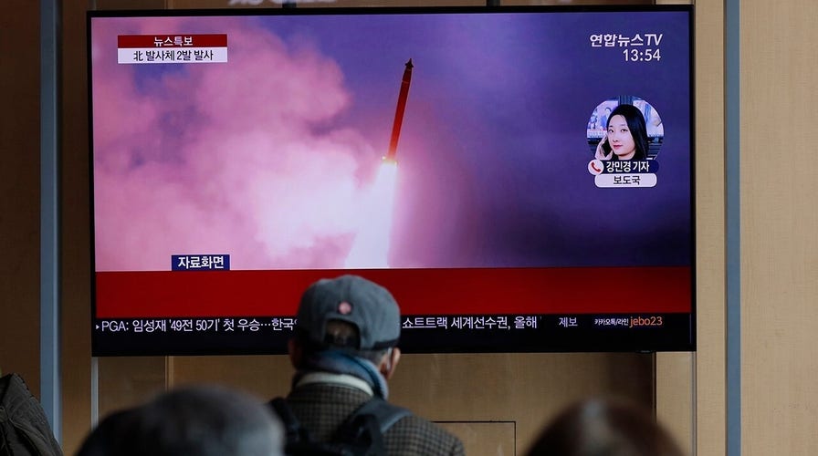 North Korea fires two unidentified projectiles