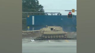 WATCH: Train smashes into mobile artillery vehicle - Fox News