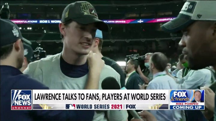 Lawrence Jones talks to Braves players, Astros fans at World Series Game 6