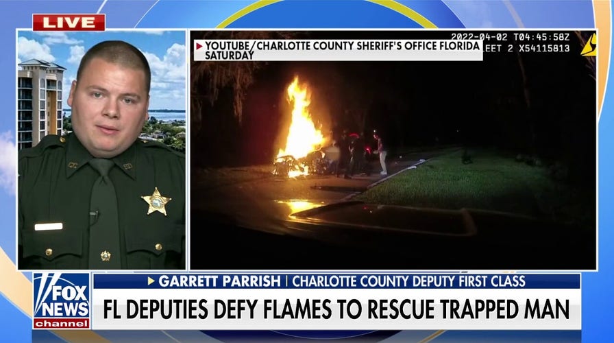 Florida officers pull man from burning car in nick of time