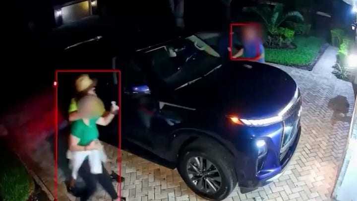 Florida couple held at gunpoint after ambush outside their home