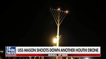 Israelis mark first night of Hanukkah as war on Hamas rages