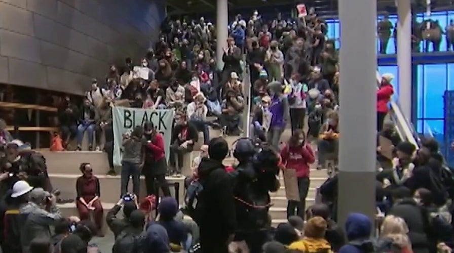 Protesters take over Seattle City Hall with calls to defund police department