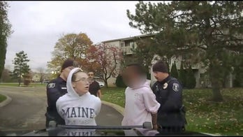 report crime news Michigan woman left puppy in dumpster, led officers on chase before crashing