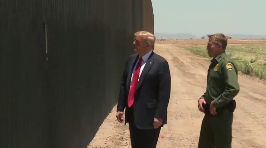 President Trump shifts focus to border security, tours border wall in Arizona