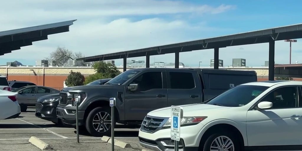 Law enforcement officials seen walking into sheriff's headquarters