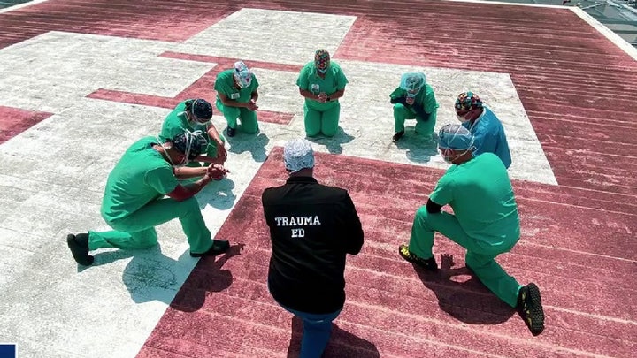 Florida health care workers gather in prayer