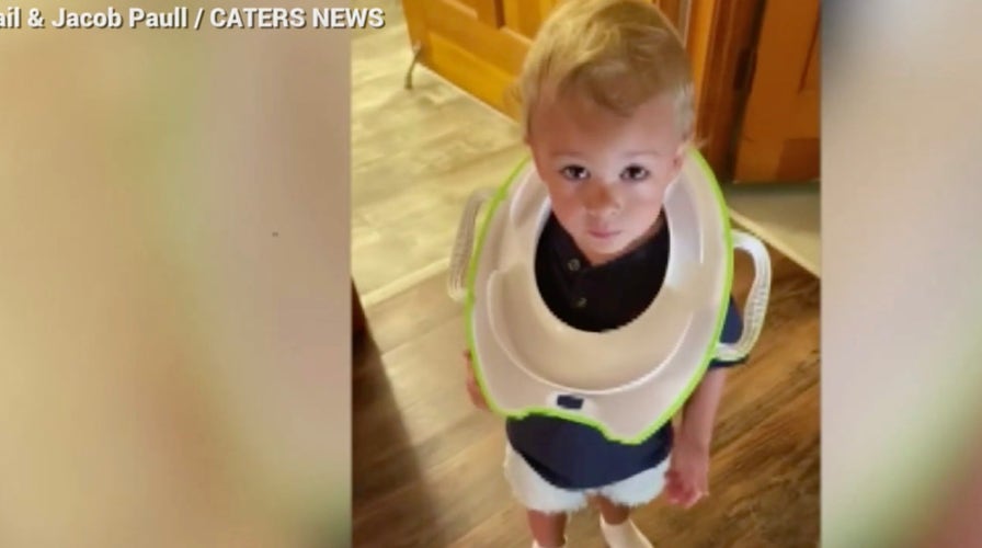 Florida toddler gets head stuck in training toilet seat