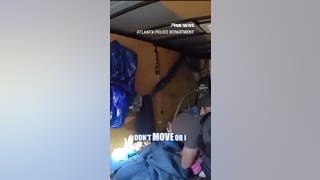 DRAMATIC footage shows police rescuing missing girls from trailer