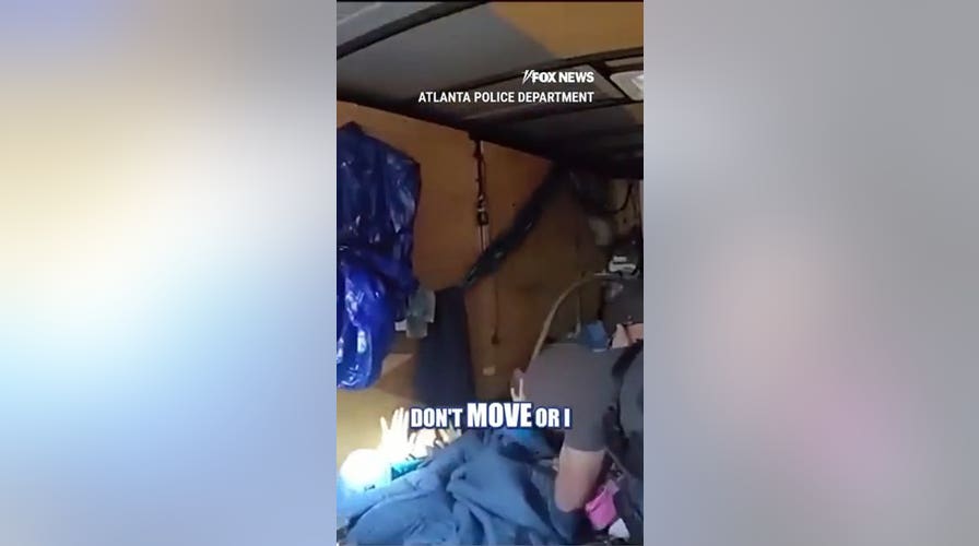DRAMATIC footage shows police rescuing missing girls from trailer