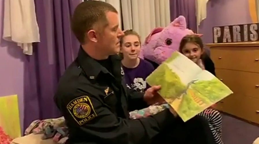 Police officers bring smiles to children amid coronavirus pandemic