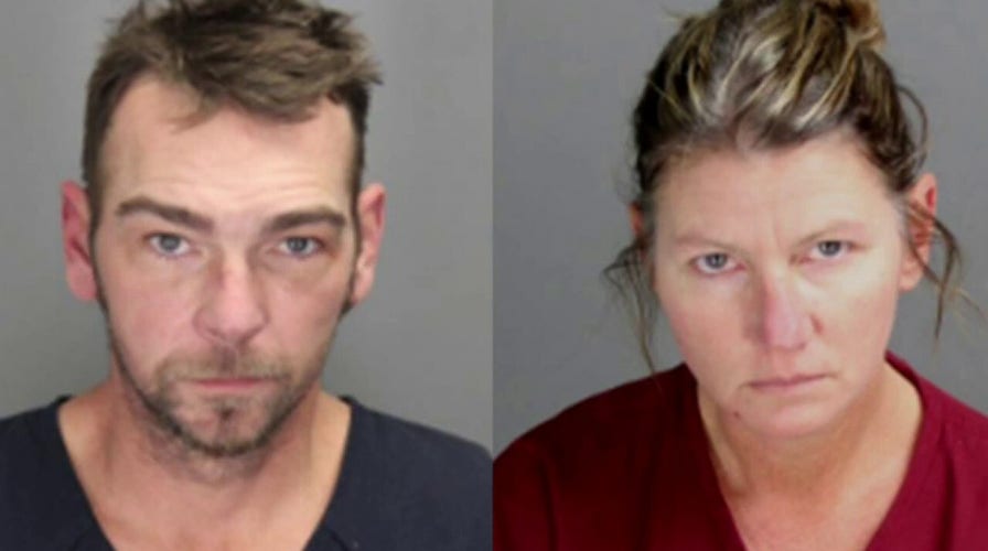 Parents of suspected Michigan shooter held on bail of $500K each