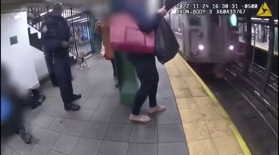 NYPD saves man from an oncoming subway train.