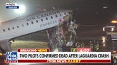 Two pilots dead after plane collides with vehicle at LaGuardia Airport