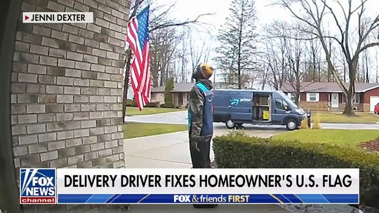 Delivery driver fixes and salutes homeowner's American flag