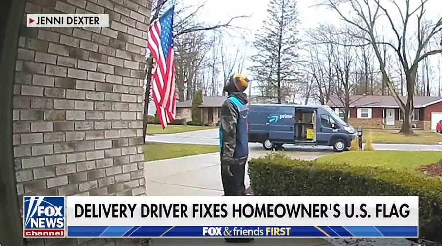 Delivery driver fixes and salutes homeowners American flag