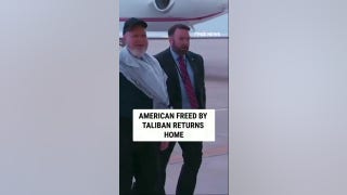 American freed by Taliban RETURNS HOME