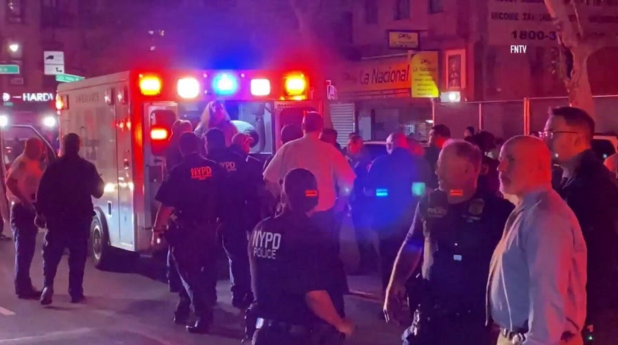 EMS responds after two NYPD officers were struck by fleeing SUV