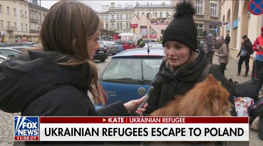 Ukrainian refugees share harrowing stories after escape to Poland train station