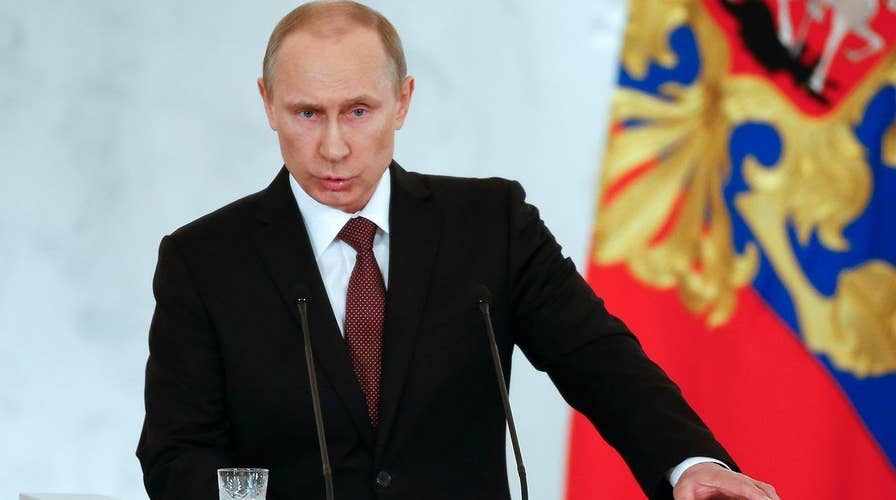 Putin lashes out at the Turks after Russian plane shot down