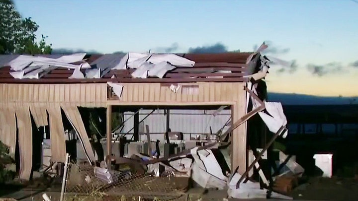At least 6 dead after over two dozen tornadoes touch down across South