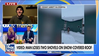 New Yorker loses two shovels on snow-covered roof