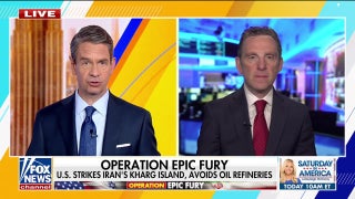 US strikes major Iranian oil hub as Trump warns of future action