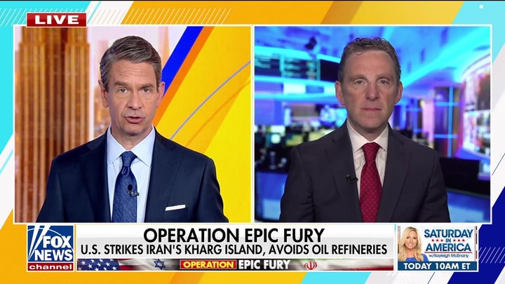 US strikes major Iranian oil hub as Trump warns of future action