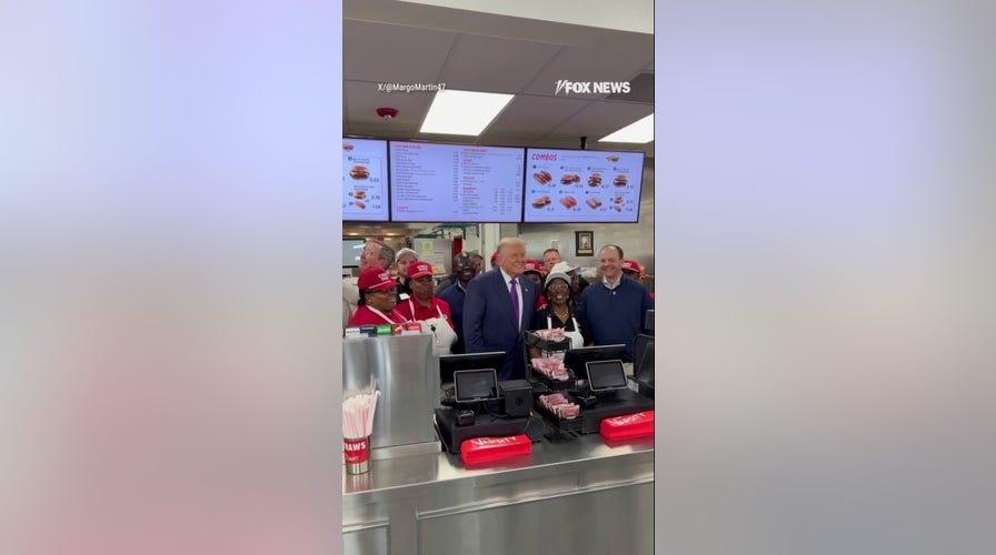 'THAT'S MY PRESIDENT!': Trump greets restaurant employees