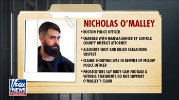 Boston police officer charged with manslaughter in carjacking incident