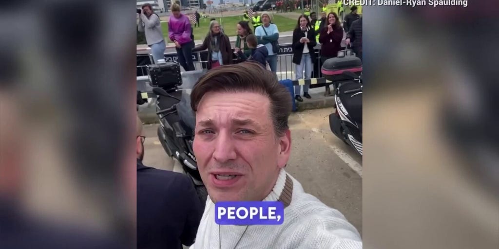 Daniel-Ryan Spaulding watches released Hamas hostages return to Israel