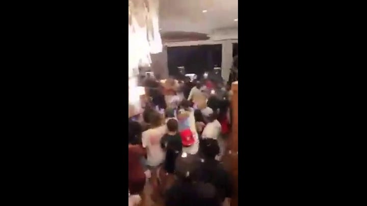 Florida teens watch boxing match during wild house party 