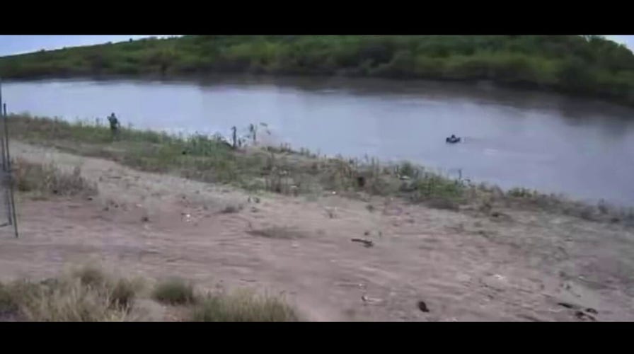 Abandoned migrant child drifts down Rio Grande on flotation device video.mp4
