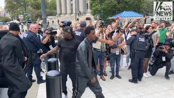 Diddy's sons arrive in court for rapper's bail appeal hearing