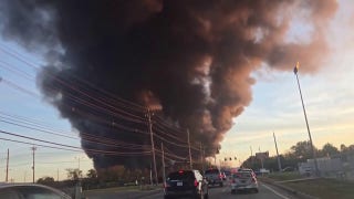 Smoke rises over Louisville after plane crash