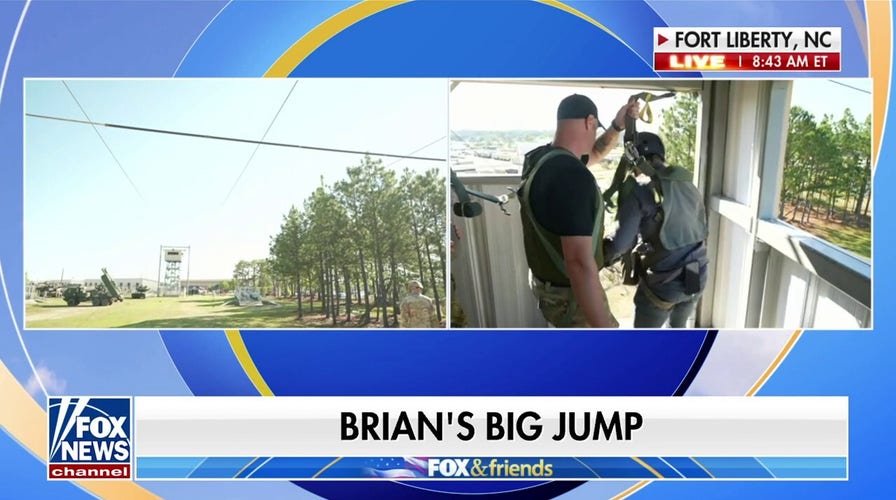 Brian Kilmeade does zipline jump at Fort Liberty