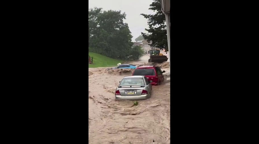 Car gets washed away during flooding in Reading, Pennsylvania