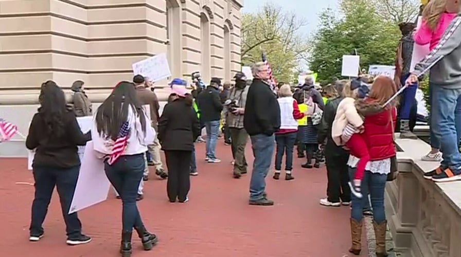 Minnesota demonstrators take stay-at-home protests to governor's residence
