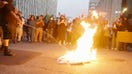 WATCH: Anti-ICE protesters seen spitting on, burning American flag in Los Angeles