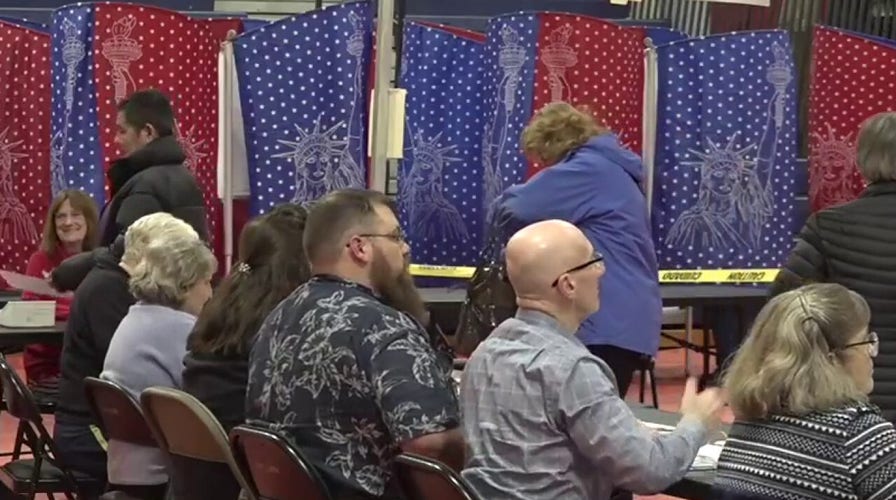 First-in-the-nation primary looks to avoid meltdown of Iowa caucuses