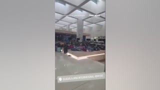 Passengers STRANDED at Mexico airport amid cartel violence