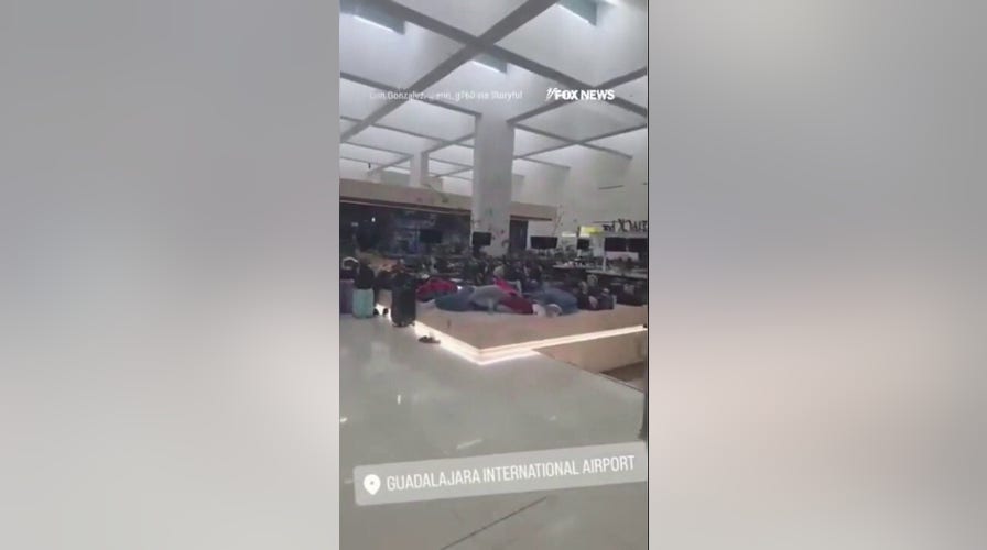 Passengers STRANDED at Mexico airport amid cartel violence