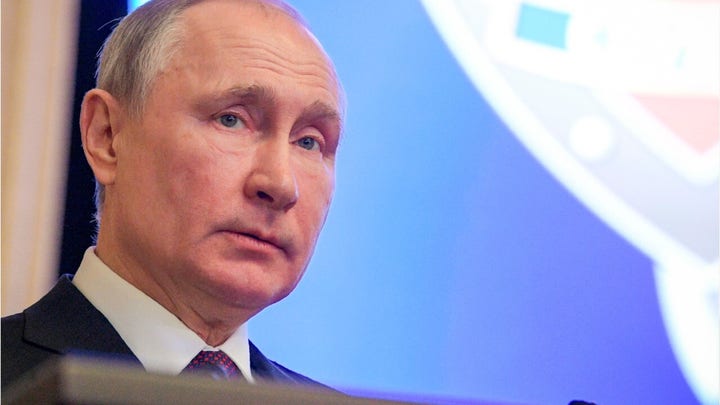 Who is Vladimir Putin, the Russian president and ex-KGB officer?