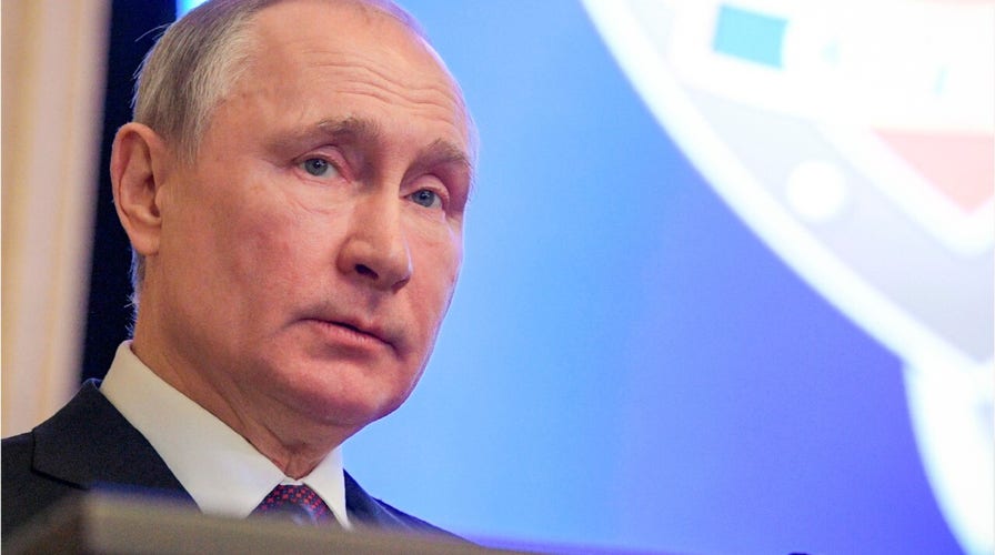 Who is Vladimir Putin, the Russian president and ex-KGB officer?
