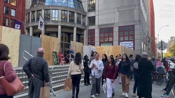 Plywood wall installed outside NYU’s Stern School of Business amid anti-Israel protests