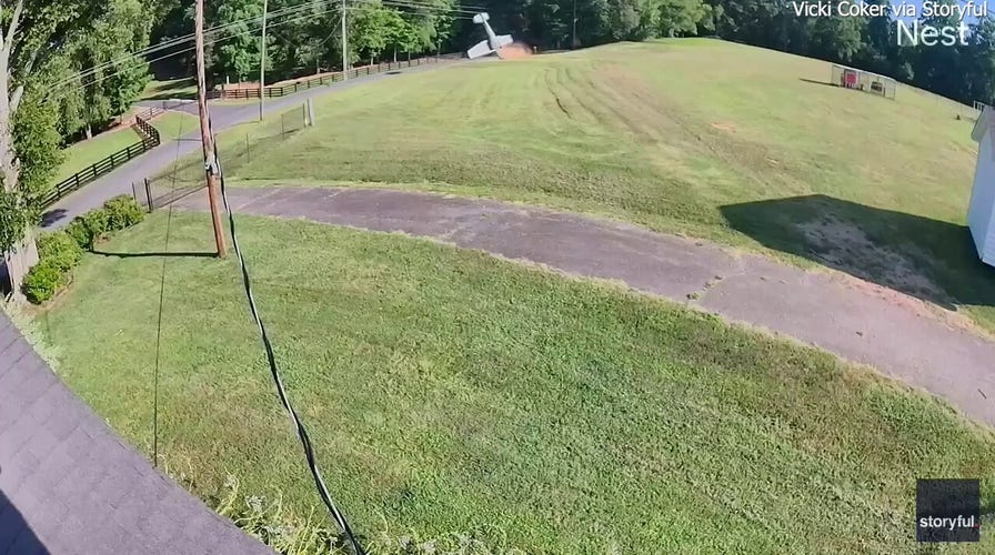Small aircraft flips after crash in South Carolina yard