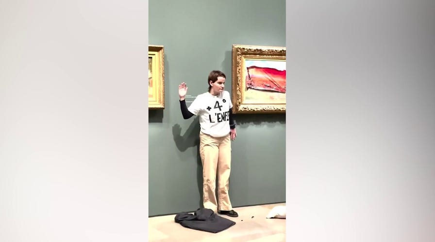 Radical climate activist vandalizes famous painting in Paris